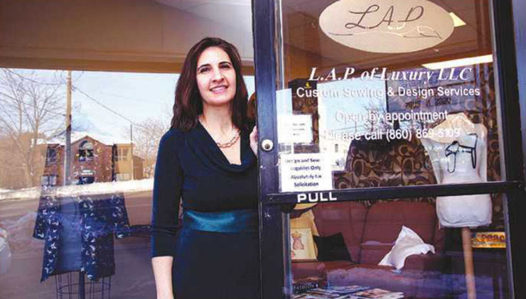 Laura Pandolfo in front of her shop on the Silas Deane Highway in Rocky Hill